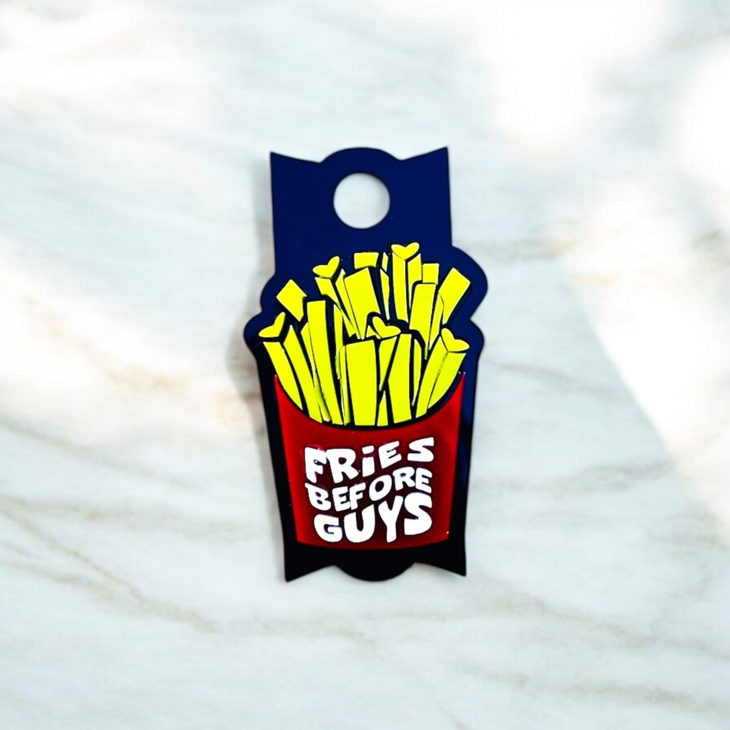 Close-up of a “Fries Before Guys” tumbler topper featuring a red fry box with yellow fries, designed for 14oz, 30oz, and 40oz tumblers.